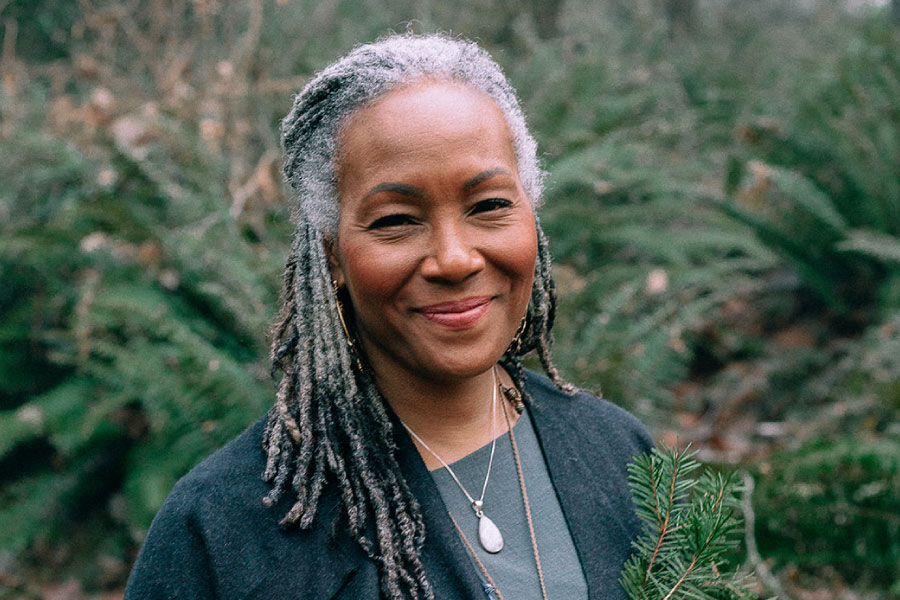 Photo so Angela at GlassWing Medicine in the forest at her home.
